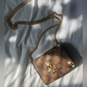 Coach wallet on a chain. Limited spring edition.